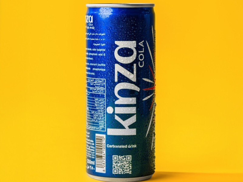 Cold canned drink on a yellow background